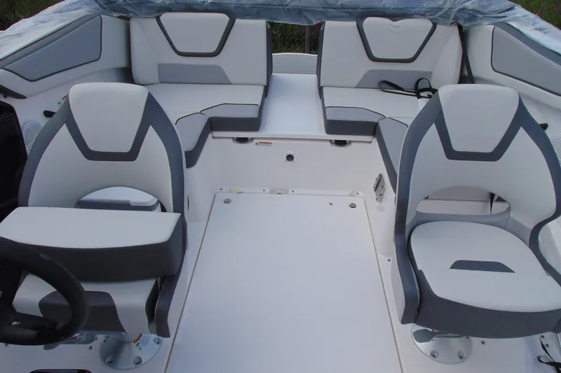 Slide: The Image of 2026 Yamaha Boats SX220 interior with modern seating and sleek design. - 17