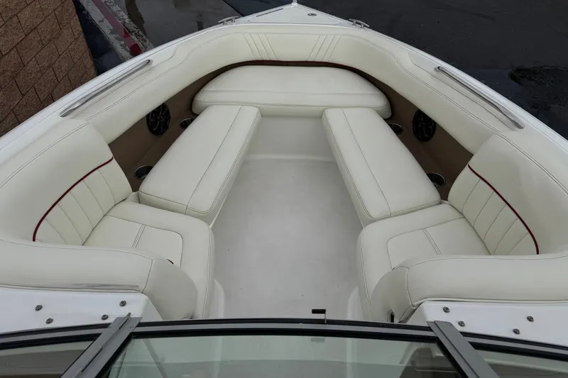 Slide: The Image of Luxurious white seating area on a 2012 Cobalt 262 WSS boat. - 15