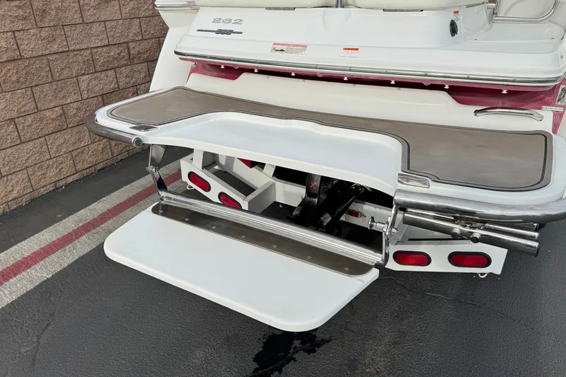 Slide: The Image of Rear view of a 2012 Cobalt 262 WSS boat with extended swim platform. - 6