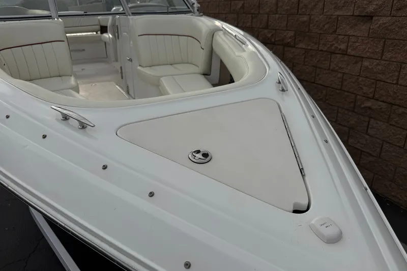 Slide: The Image of 2012 Cobalt 262 WSS boat with white interior and sleek design. - 13
