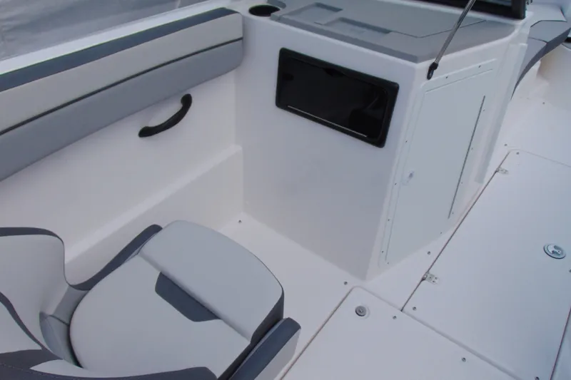 Slide: The Image of 2026 Yamaha Boats SX220 interior with sleek seating and modern design features. - 9