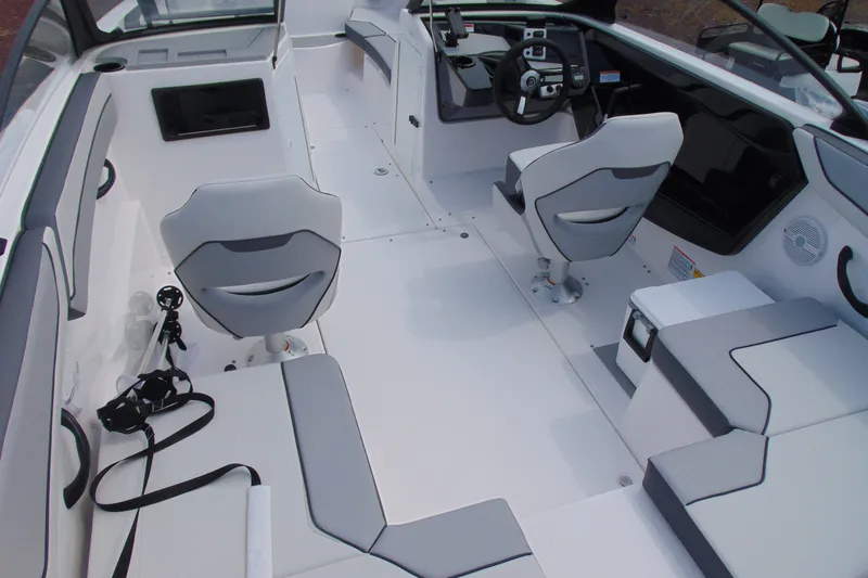 Slide: The Image of 2026 Yamaha Boats SX220 interior with modern seating and sleek design. - 7
