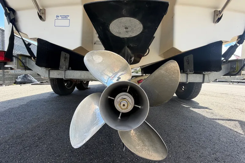 Slide: The Image of Rear view of a 2003 Chaparral 183 SS boat showing the propeller and trailer. - 5