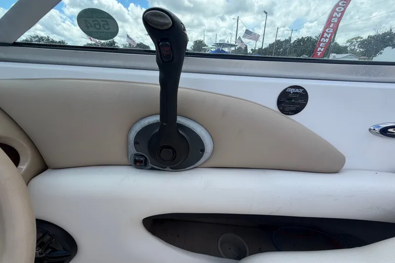 Slide: The Image of Close-up of 2003 Chaparral 183 SS boat throttle control in beige interior. - 27