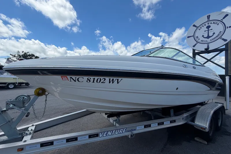 Slide: The Image of 2003 Chaparral 183 SS boat on trailer under blue sky. - 8