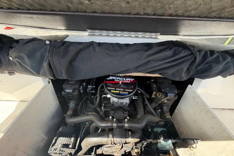 Slide: The Image of Engine compartment of a 2003 Chaparral 183 SS boat with Mercury MerCruiser engine. - 56