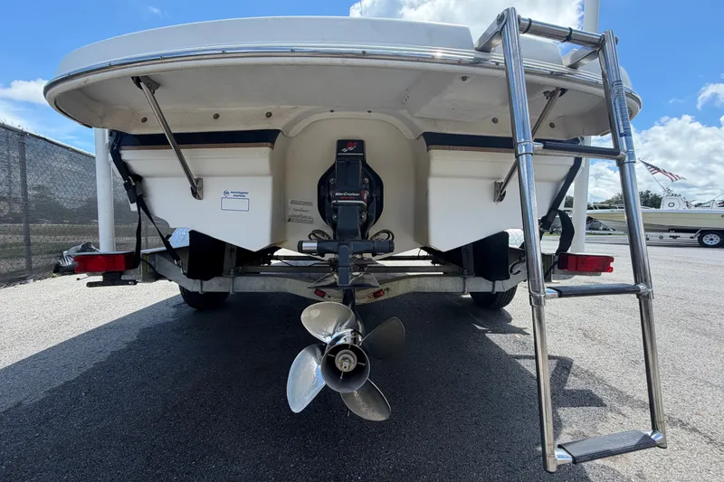 Slide: The Image of 2003 Chaparral 183 SS boat rear view with ladder and propeller. - 4