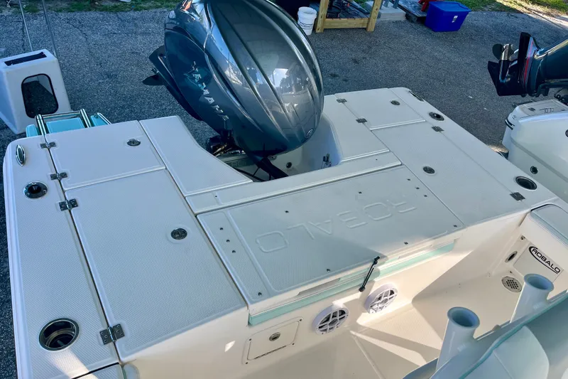Slide: The Image of 2027 Robalo 226 Cayman boat with Yamaha outboard engine, viewed from the rear deck. - 9