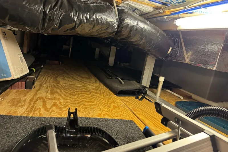 Slide: The Image of Under-deck storage area of a 2005 Sumerset 16'6" X 63 houseboat. - 106