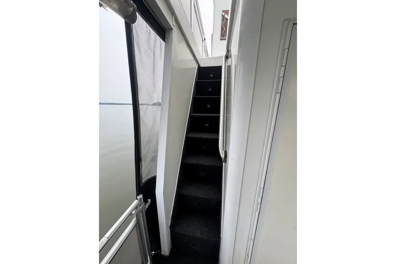 Slide: The Image of Staircase on 2005 Sumerset 16'6" X 63 houseboat with lake view. - 94
