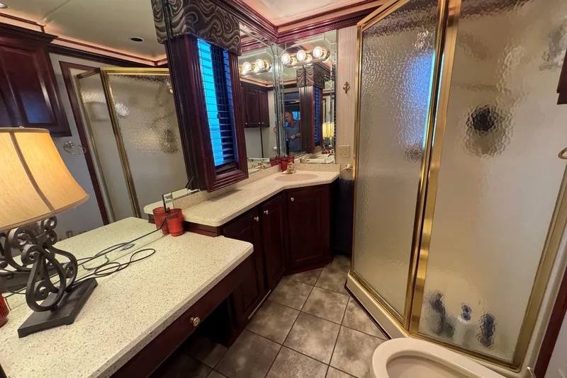 Slide: The Image of Luxurious bathroom in a 2005 Sumerset houseboat with elegant fixtures and spacious design. - 86