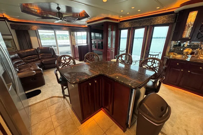 Slide: The Image of Luxurious 2005 Sumerset houseboat interior with elegant kitchen and lake view. - 55