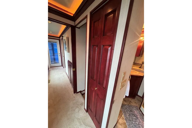 Slide: The Image of Hallway in 2005 Sumerset houseboat with wooden doors and carpet flooring. - 71