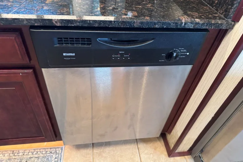 Slide: The Image of Stainless steel dishwasher in a 2005 Sumerset 16'6" X 63 houseboat kitchen. - 60