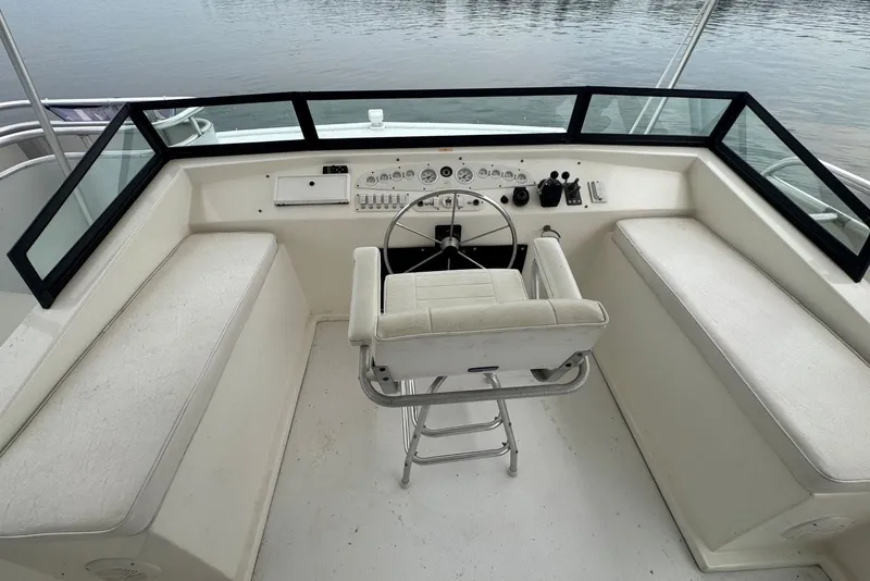 Slide: The Image of Helm of 2005 Sumerset 16'6" X 63 houseboat with steering wheel and controls. - 24