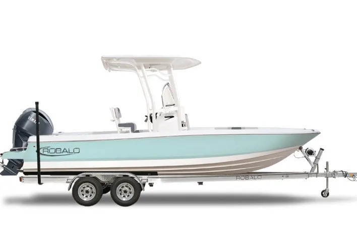 The Image of 2027 Robalo 226 Cayman boat on trailer, side view, light blue hull, outboard motor. - 1