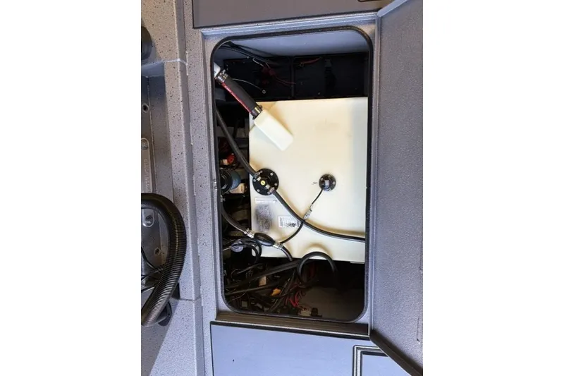 Slide: The Image of 2027 Xpress H20 Crappie boat interior wiring and components view. - 21