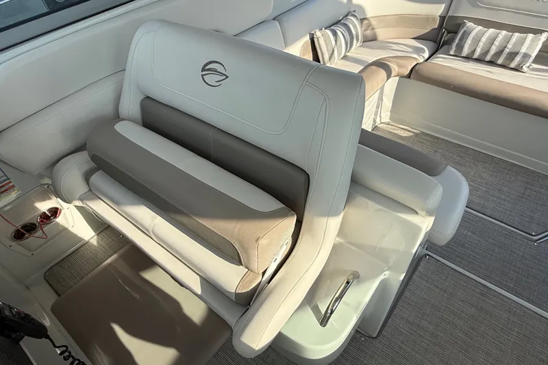 Slide: The Image of Luxurious interior seating of 2019 Crownline 350 SY boat with elegant upholstery. - 15