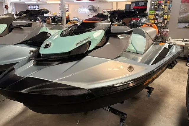 The Image of 2023 Sea-Doo GTI SE 170 jet ski in showroom, featuring sleek design and modern features. - 0