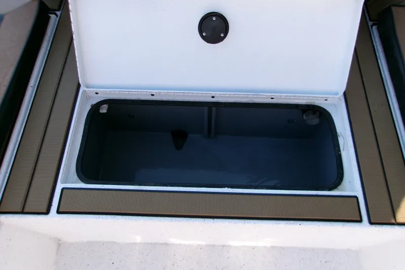 Slide: The Image of Open storage compartment on 2026 Xpress XR21 Bay boat. - 4