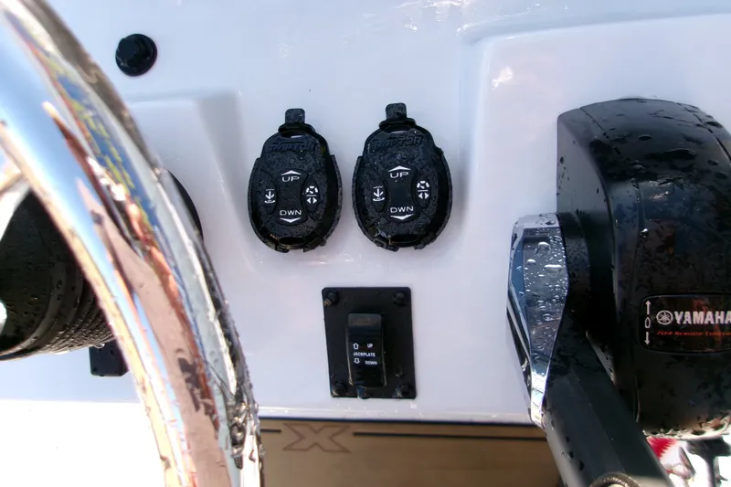 Slide: The Image of Control panel of 2026 Xpress XR21 Bay boat with Yamaha throttle and switches. - 6