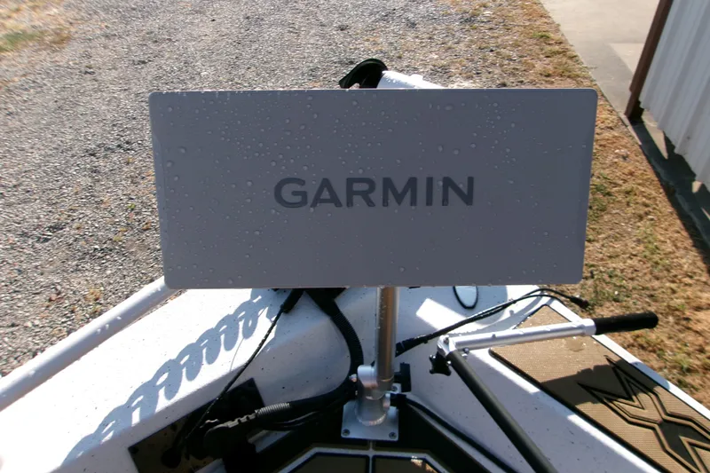 Slide: The Image of Garmin device on 2026 Xpress XR21 Bay boat, outdoor setting. - 13