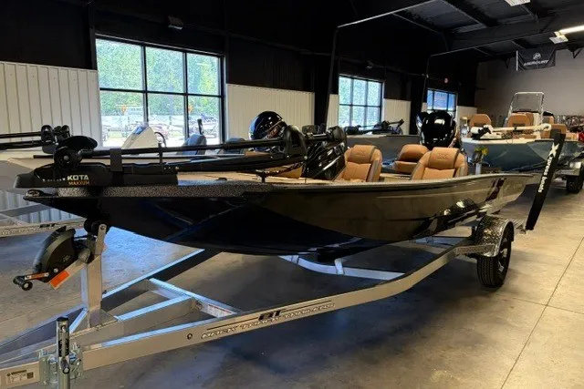 The Image of 2027 Xpress H18 Bass boat in showroom, featuring sleek design and modern equipment. - 1