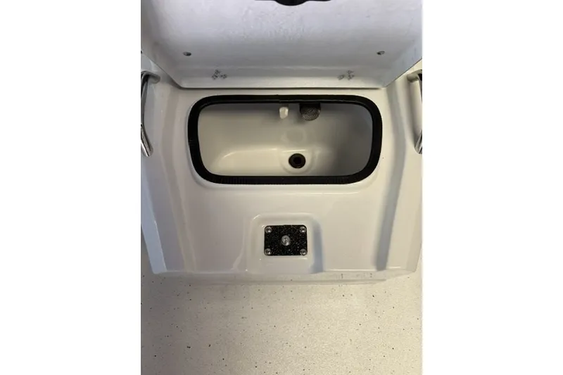 Slide: The Image of 2027 Xpress H20 Bay boat compartment with open hatch and interior view. - 13
