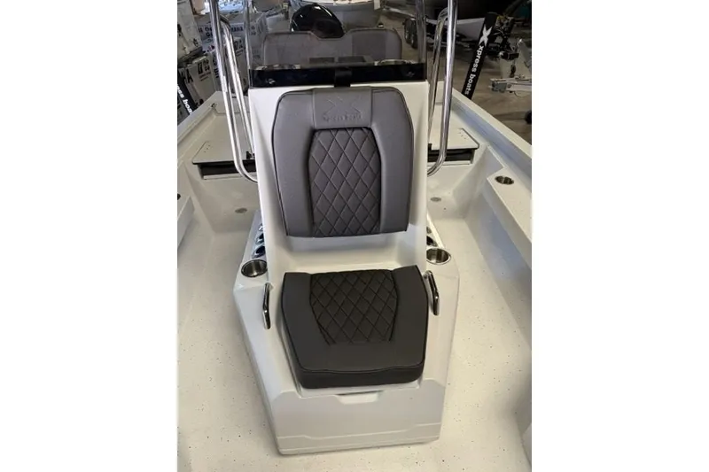Slide: The Image of 2027 Xpress H20 Bay boat seat with diamond-stitched upholstery and cup holders. - 12