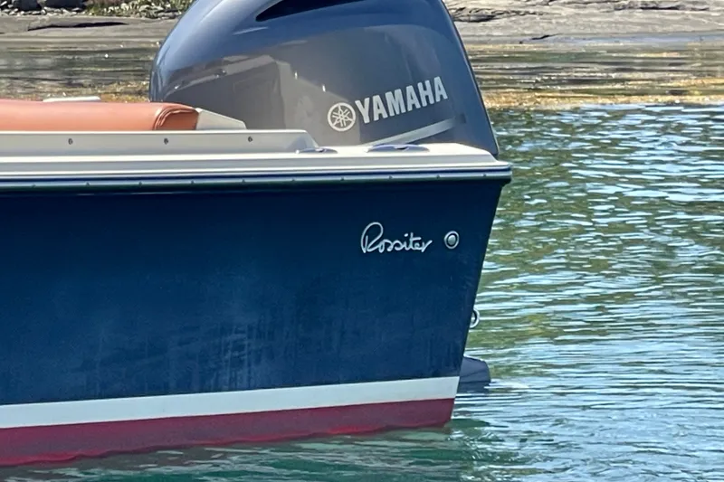 Slide: The Image of 2022 Rossiter 20 boat with Yamaha engine on calm water. - 15