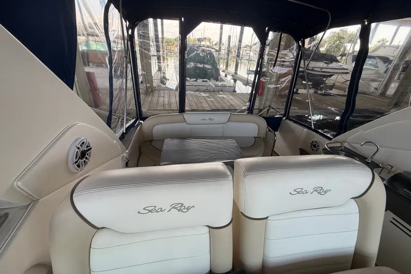 Slide: The Image of Interior view of 2012 Sea Ray Sundancer 330 yacht with seating and clear canopy. - 32