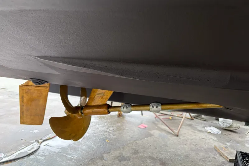Slide: The Image of Propeller and rudder of 2012 Sea Ray Sundancer 330 boat in dry dock. - 34