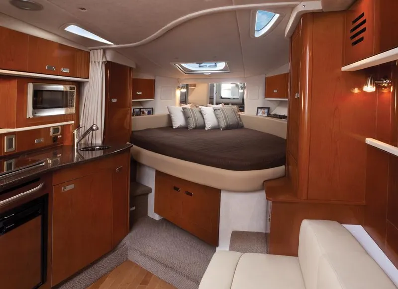 Slide: The Image of Manufacturer Provided Image: Interior of 2012 Sea Ray 330 Sundancer yacht with modern amenities. - 16