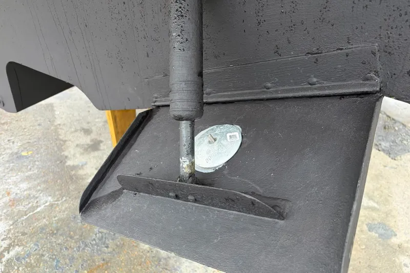 Slide: The Image of Close-up of a 2012 Sea Ray Sundancer 330 boat's hull with zinc anode. - 36
