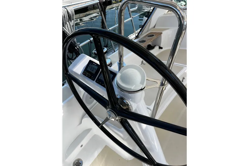Slide: The Image of Steering wheel of 2024 Tartan 395 sailboat with navigation display. - 50