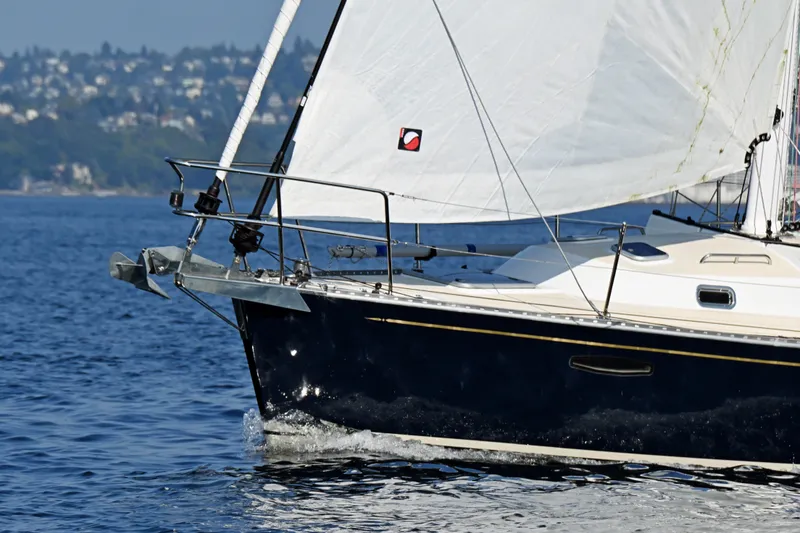Slide: The Image of Sailing yacht Tartan 395, 2024 model, cruising on calm waters. - 63