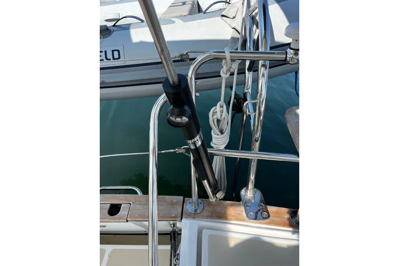 Slide: The Image of Stainless steel railing on 2024 Tartan 395 yacht, featuring marine hardware and rope details. - 52