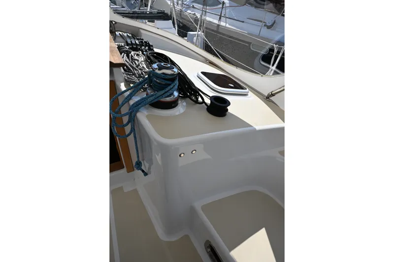 Slide: The Image of 2024 Tartan 395 sailboat deck with ropes and winch system. - 44