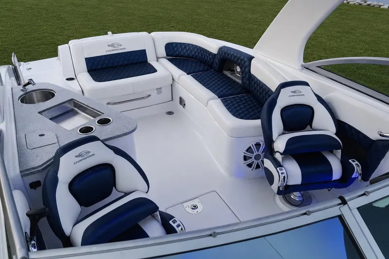Slide: The Image of Luxurious interior of 2013 Chaparral 287 SSX boat with plush seating and amenities. - 21