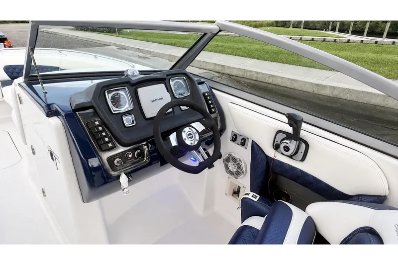 Slide: The Image of Interior view of 2013 Chaparral 287 SSX boat dashboard with Garmin navigation system. - 29