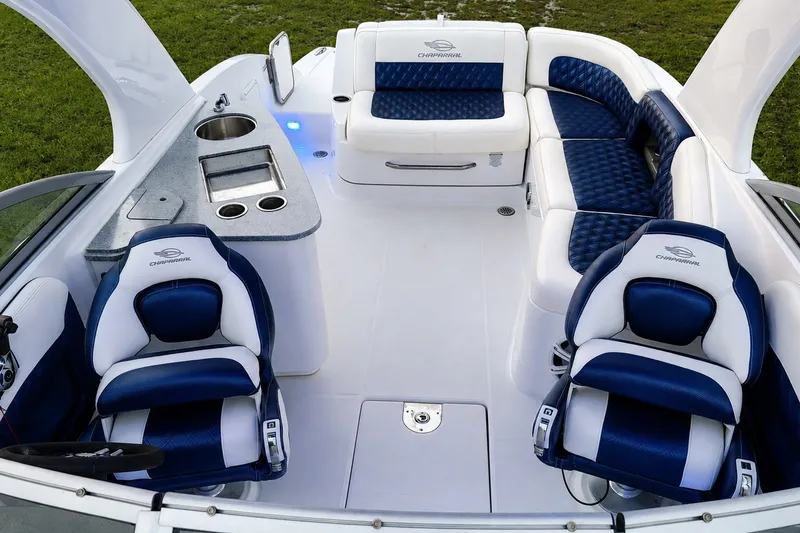 Slide: The Image of Luxurious interior of 2013 Chaparral 287 SSX boat with blue and white seating. - 22
