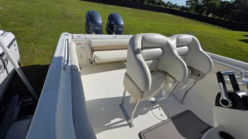 Slide: The Image of The image shows the cockpit of a 2006 Hydra-Sports 2500 CC boat with two seats. - 16