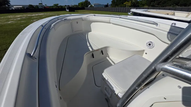 Slide: The Image of The image shows the bow area of a 2006 Hydra-Sports 2500 CC boat with seating and storage. - 17