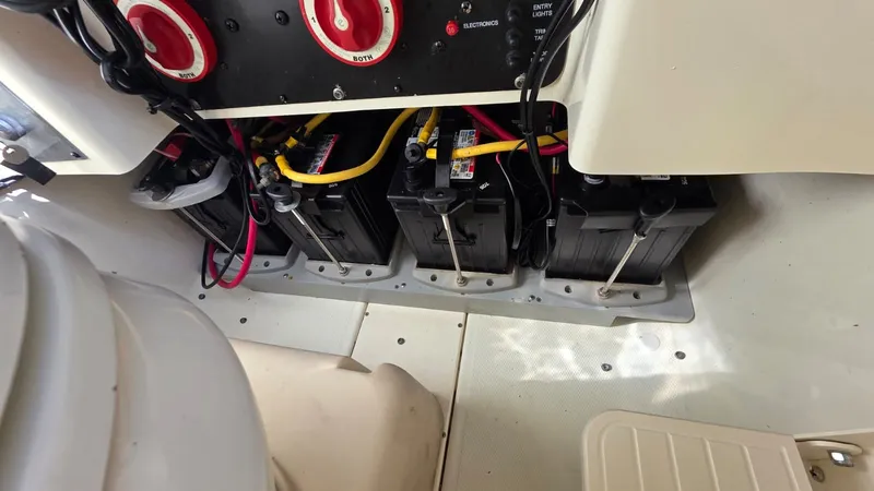 Slide: The Image of Batteries and wiring inside a 2006 Hydra-Sports 2500 CC. - 11