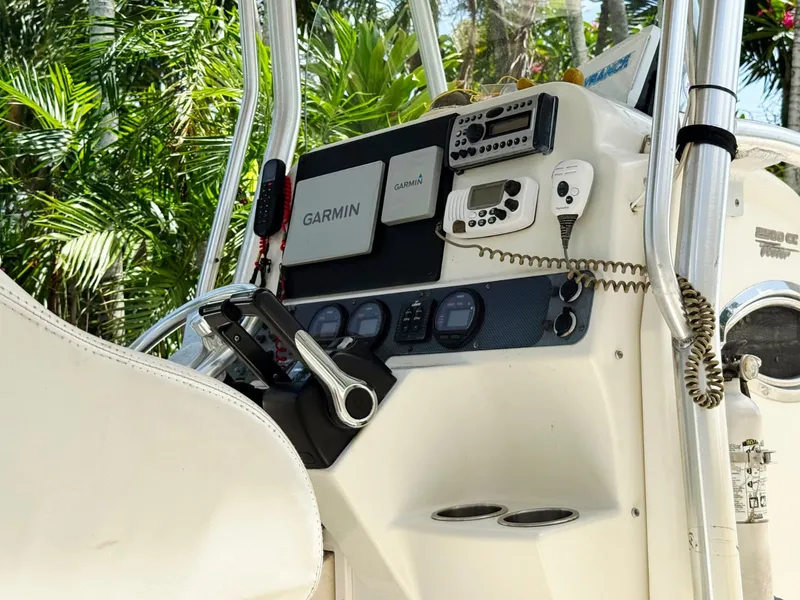 Slide: The Image of The image shows the cockpit of a 2006 Hydra-Sports 2500 CC boat with Garmin electronics. - 21