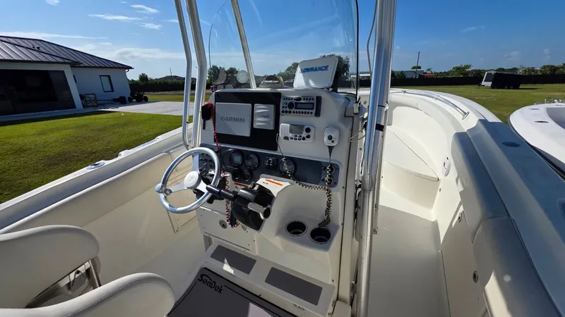 Slide: The Image of The image shows the cockpit of a 2006 Hydra-Sports 2500 CC with modern electronics. - 19