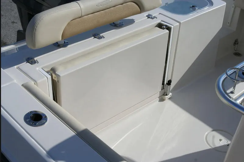 Slide: The Image of Manufacturer Provided Image: 2016 Cobia 237 Center Console boat seating and storage area. - 14