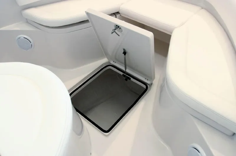 Slide: The Image of Manufacturer Provided Image: 2016 Cobia 237 Center Console boat with open storage compartment. - 9