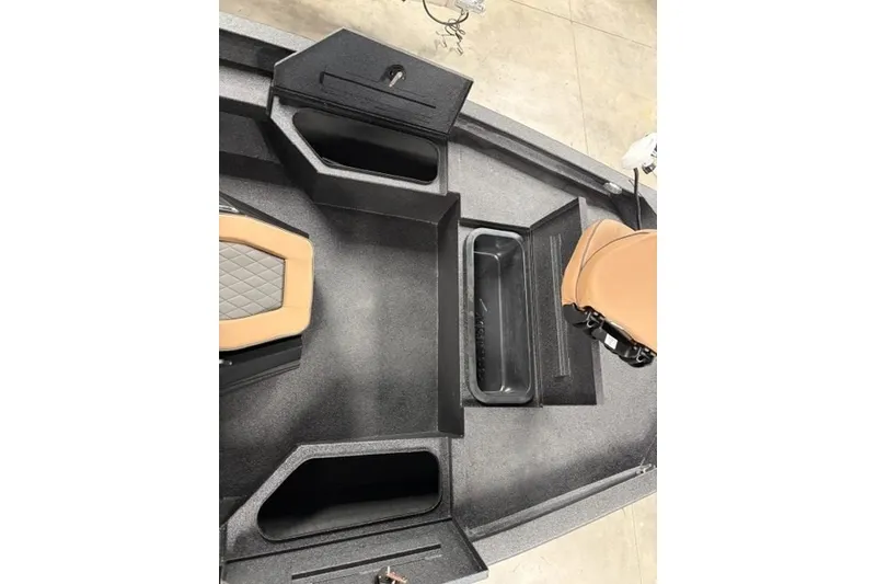 Slide: The Image of 2027 Xpress H20 Bay boat interior with storage compartments and seating. - 9