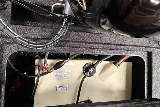 Slide: The Image of 2027 Xpress H20 Bay boat fuel system with visible wiring and components. - 17